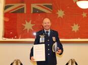 St George Police Area Command's Superintendent Rohan Cramsie with his certificate of congratulations from Bayside Council.