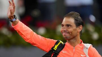 Spaniard Rafael Nadal waves to the crowd after losing to Jiri Lehecka at the Madrid Open. (AP PHOTO)